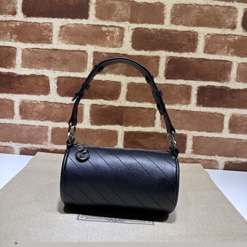 G*u*i round bags